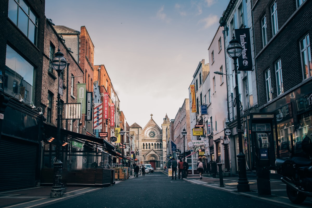 Temple Bar in Dublin at night with classic red and yellow signage